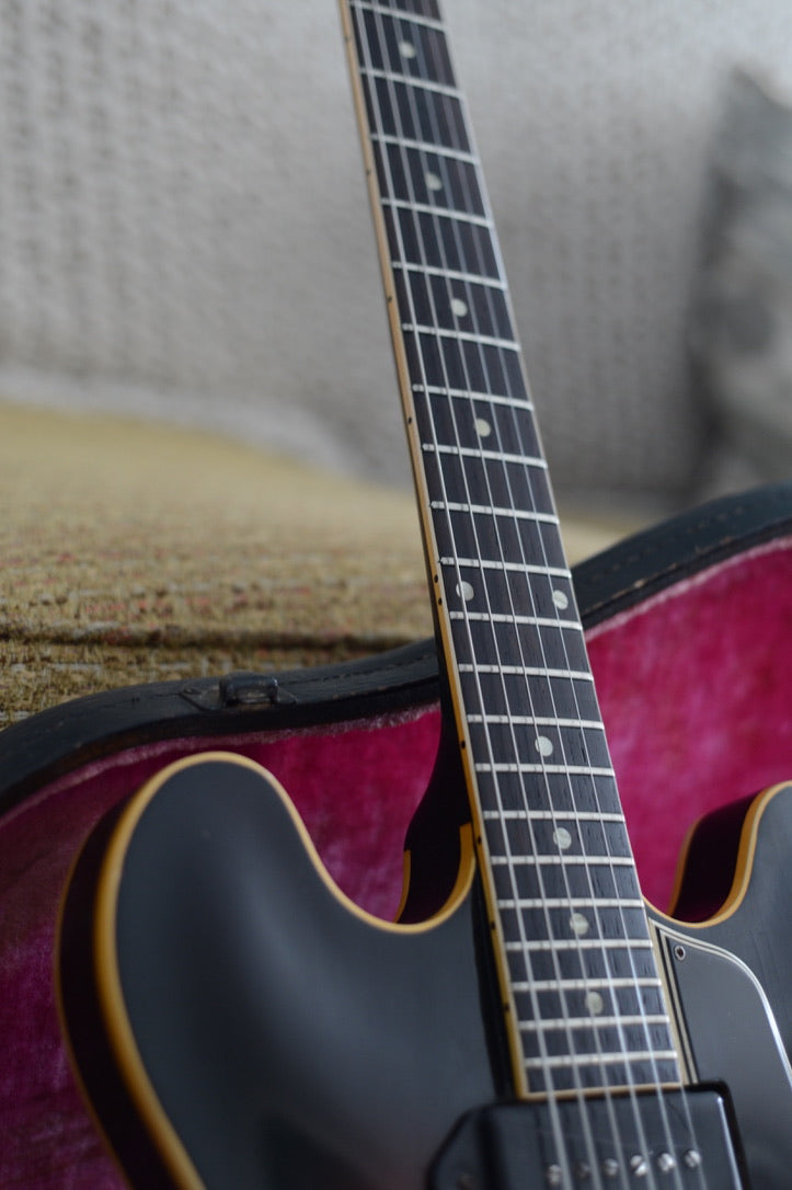 Close up on original 1960 brazillian rosewood fretboard with dot inlays