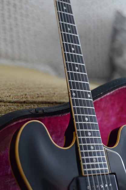 Close up on original 1960 brazillian rosewood fretboard with dot inlays