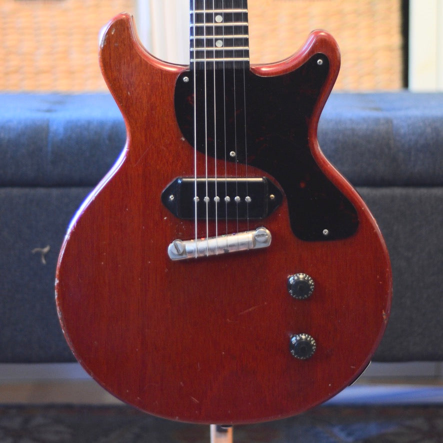 Close-up of a Cherry Red Les Paul Junior with a blurred background