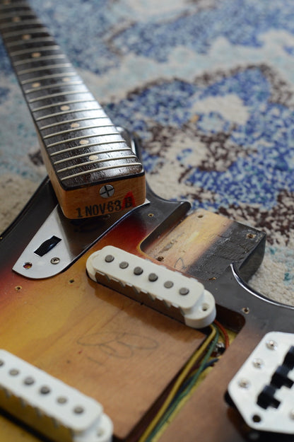 Neck heel of 1963 Fender Jaguar reading "1NOV63B"