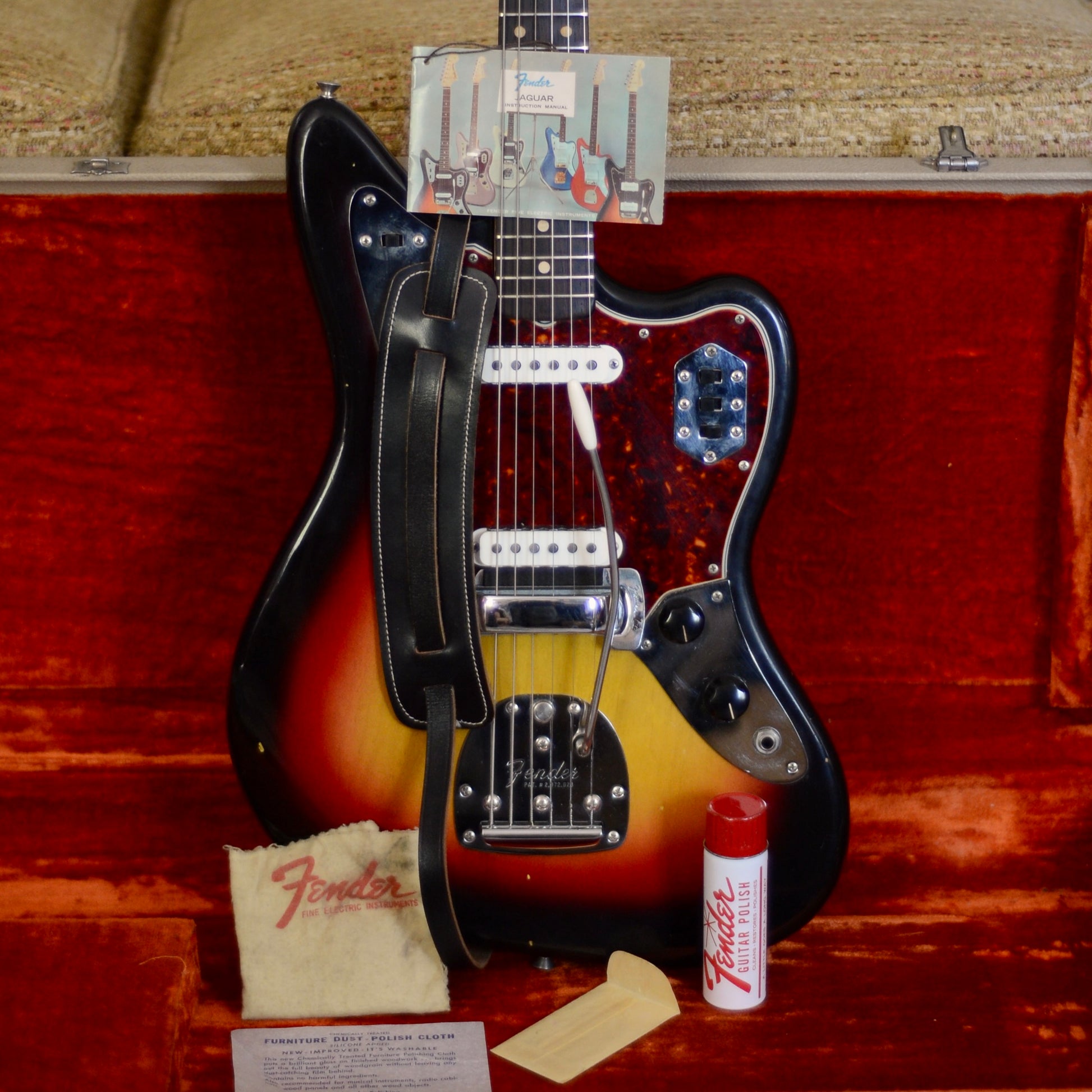 1960s Fender Jaguar in Sunburst with case candy in original tolex case