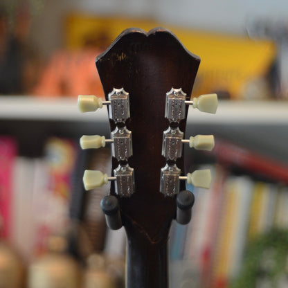 Shows the back of Epiphone RIviera headstock, shows replaced tuners